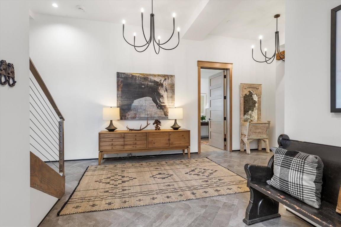 1855 Burgess Creek Road, Unit 4 Steamboat Springs, CO 80487 - Photo 5 of 45 a bedroom with furniture and wooden floor