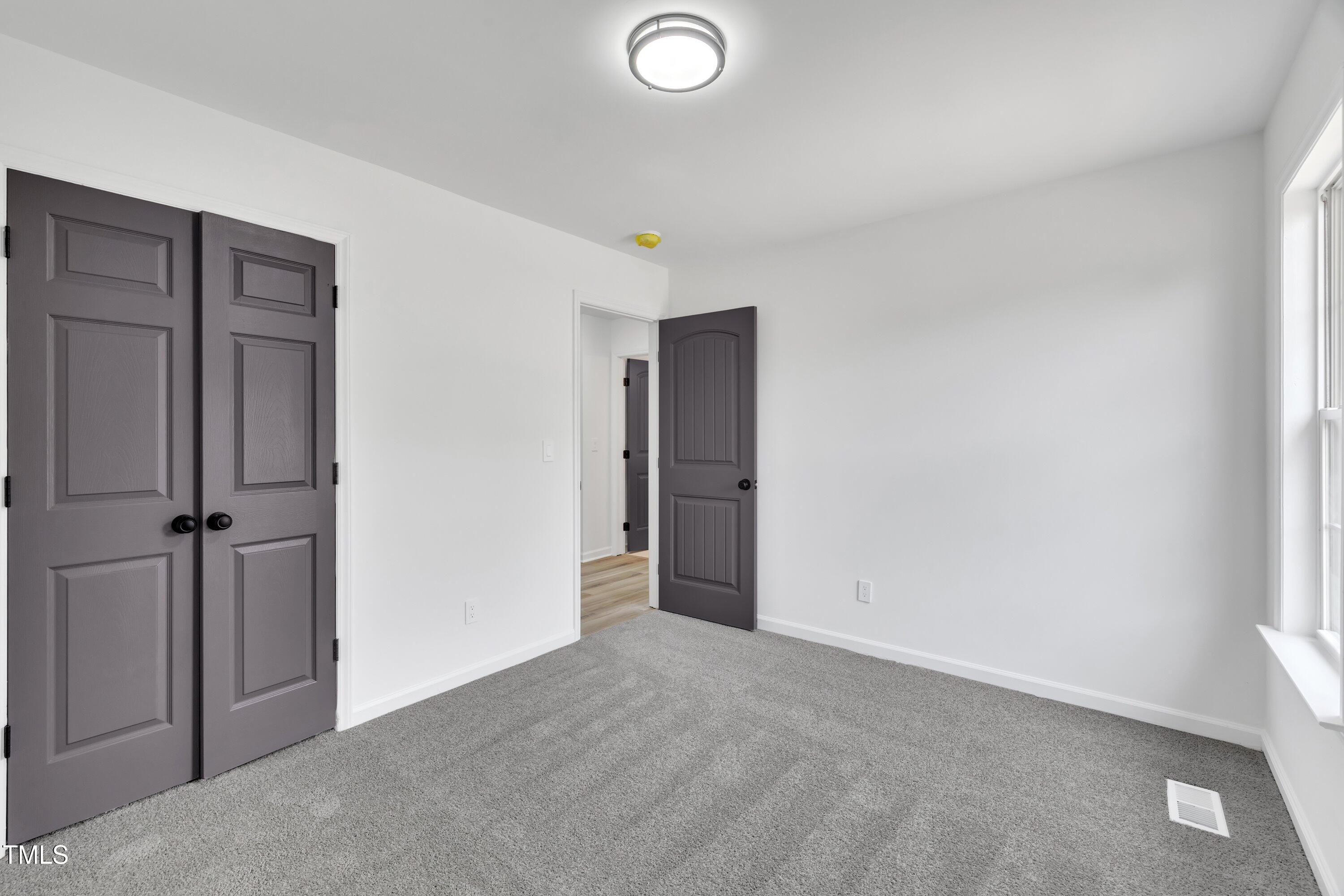 112 Edmondson Drive Willow Spring, NC 27592 - Photo 20 of 32 a view of an empty room