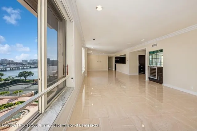 a view of a large room with windows