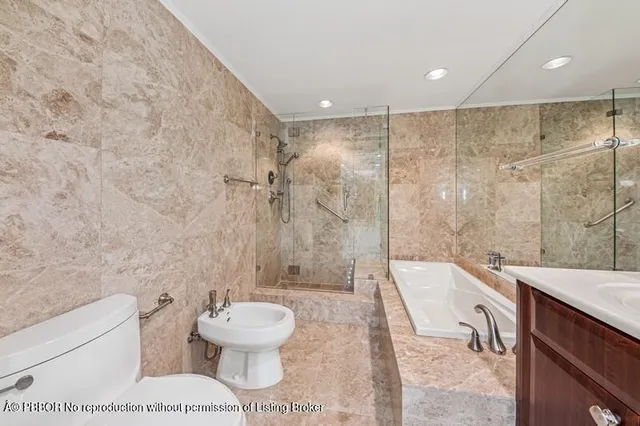 a living room with furniture a rug and a window