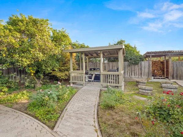a outdoor living space with furniture and garden