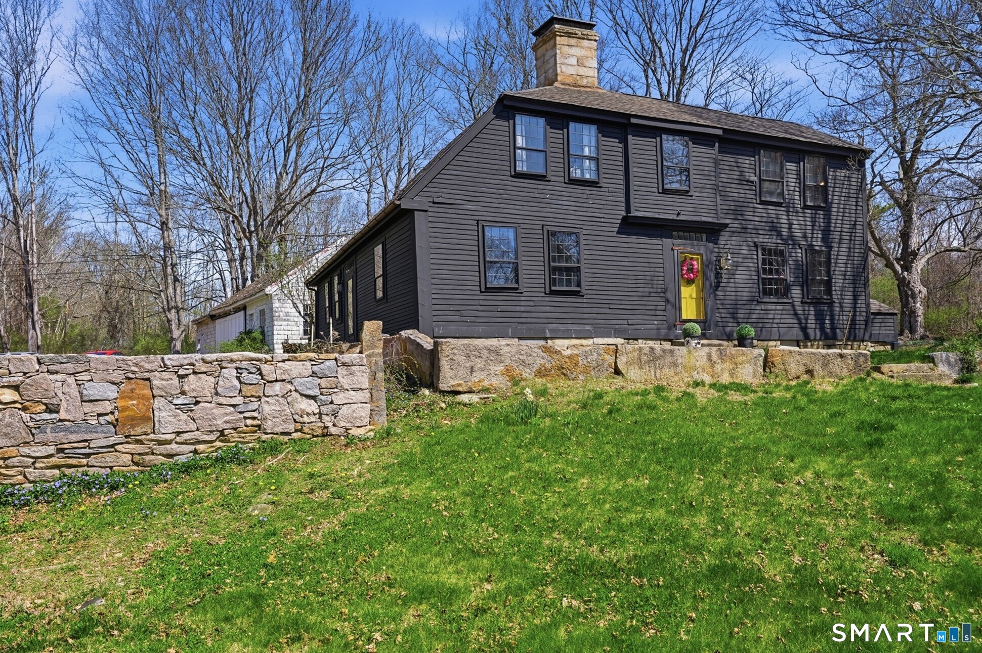 604 Pendleton Hill Road North Stonington, CT 06359 - Photo 1 of 39 a front view of house with a garden