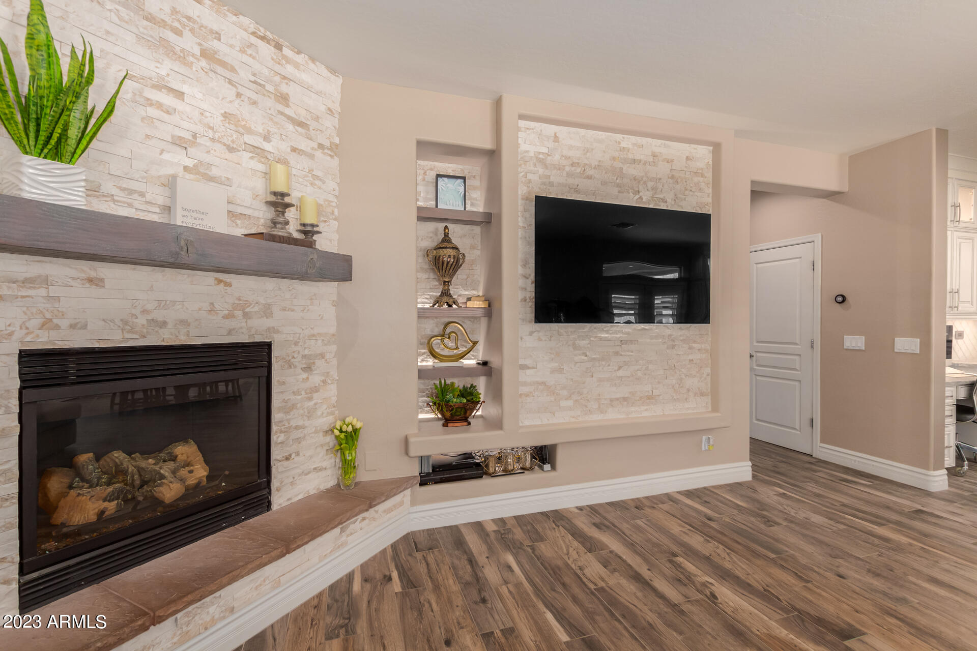 3416 West Montello Road Phoenix, AZ 85086 - Photo 16 of 71 a living room with a fireplace