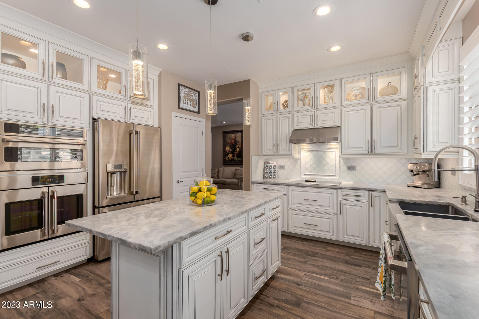 3416 West Montello Road Phoenix, AZ 85086 - Photo 23 of 71 a kitchen with stainless steel appliances granite countertop a stove refrigerator and cabinets