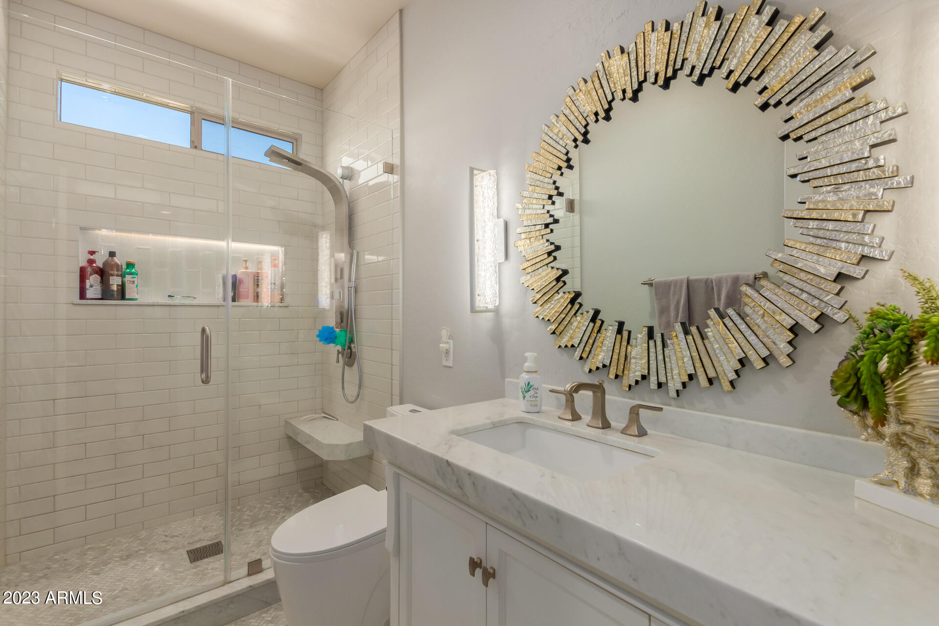 3416 West Montello Road Phoenix, AZ 85086 - Photo 42 of 71 a bathroom with a sink a toilet and shower