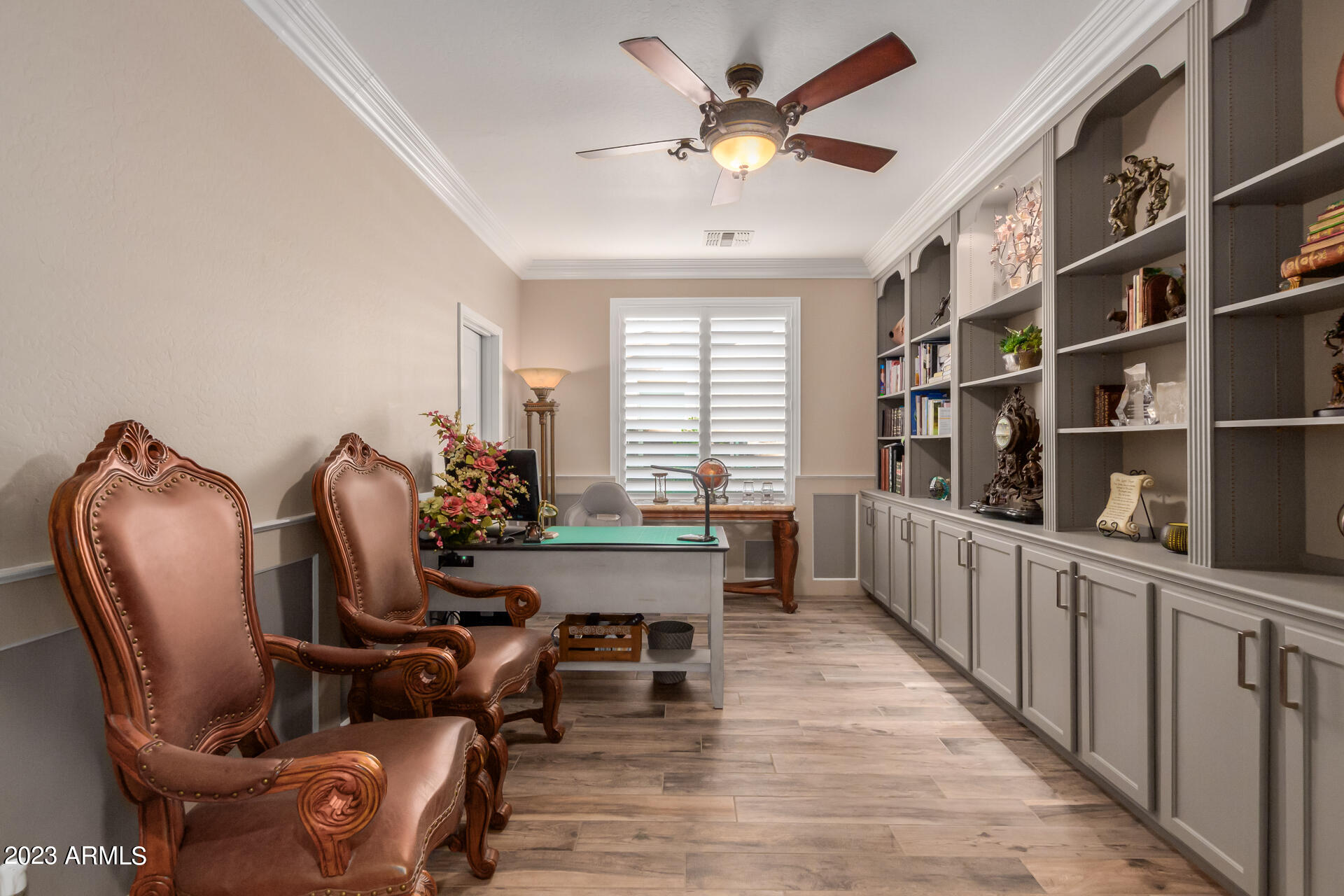 3416 West Montello Road Phoenix, AZ 85086 - Photo 44 of 71 a workspace with furniture window and wooden floor