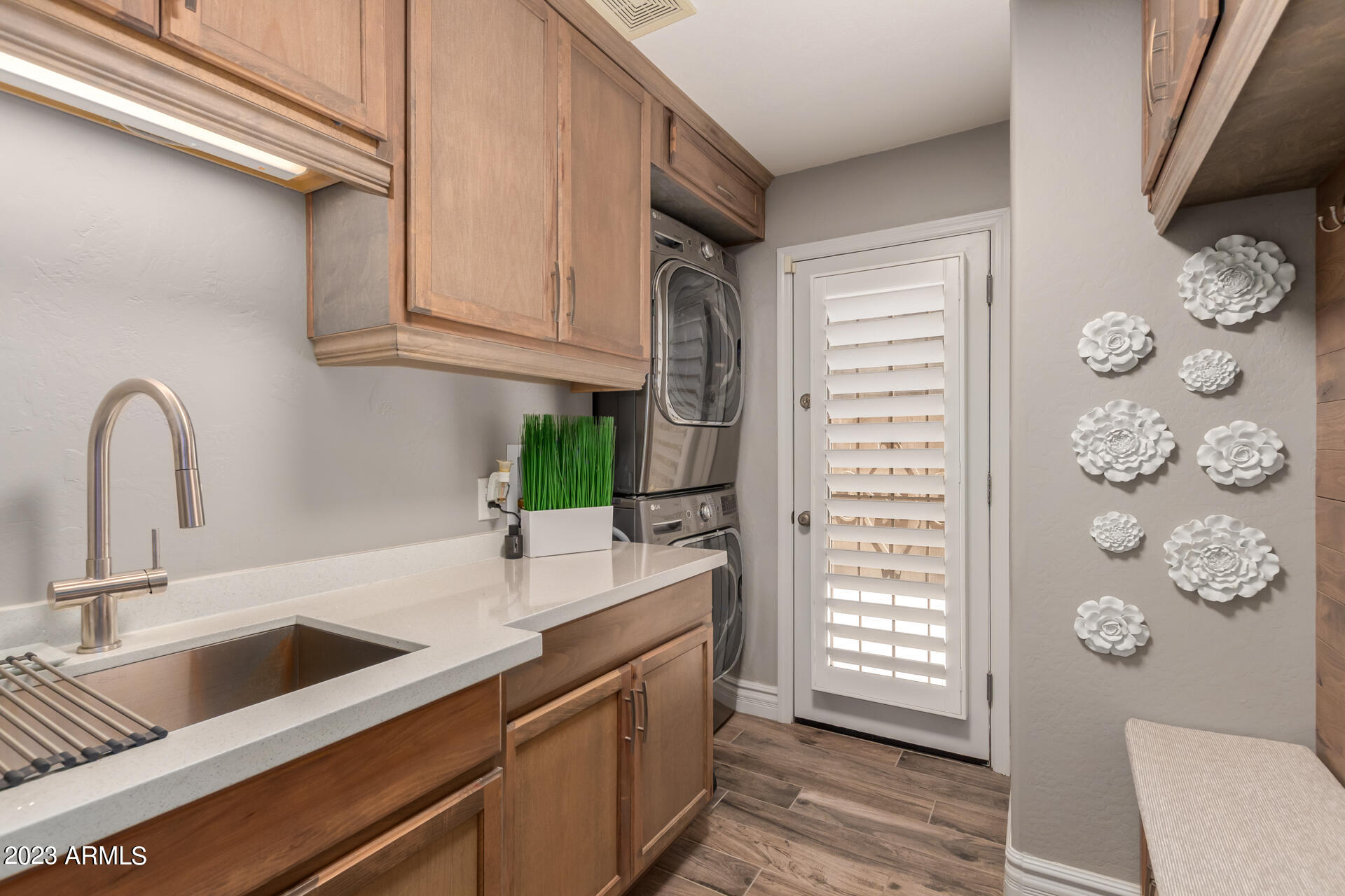 3416 West Montello Road Phoenix, AZ 85086 - Photo 46 of 71 a kitchen with granite countertop a sink and a stove