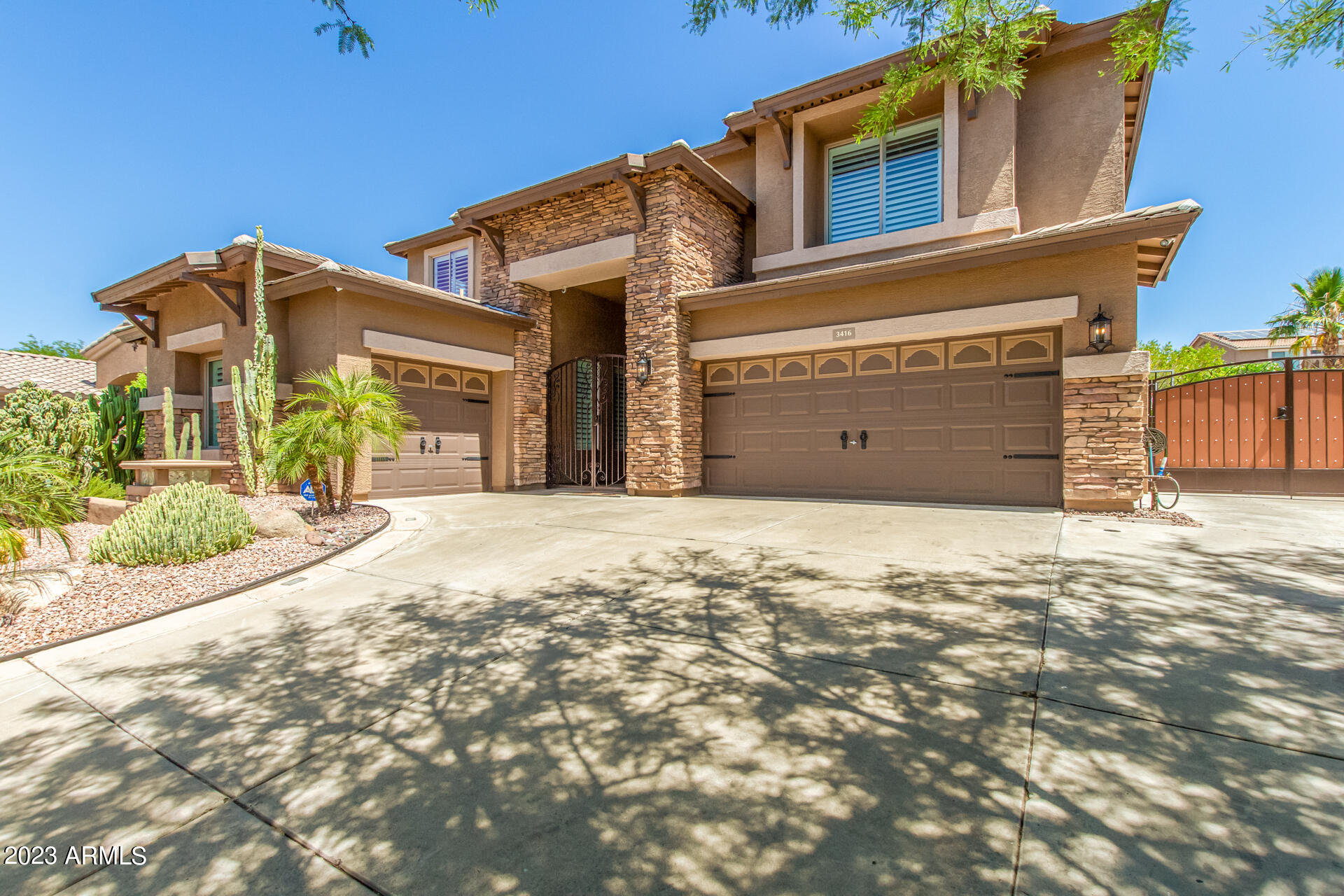 3416 West Montello Road Phoenix, AZ 85086 - Photo 5 of 71 a front view of a house with a yard