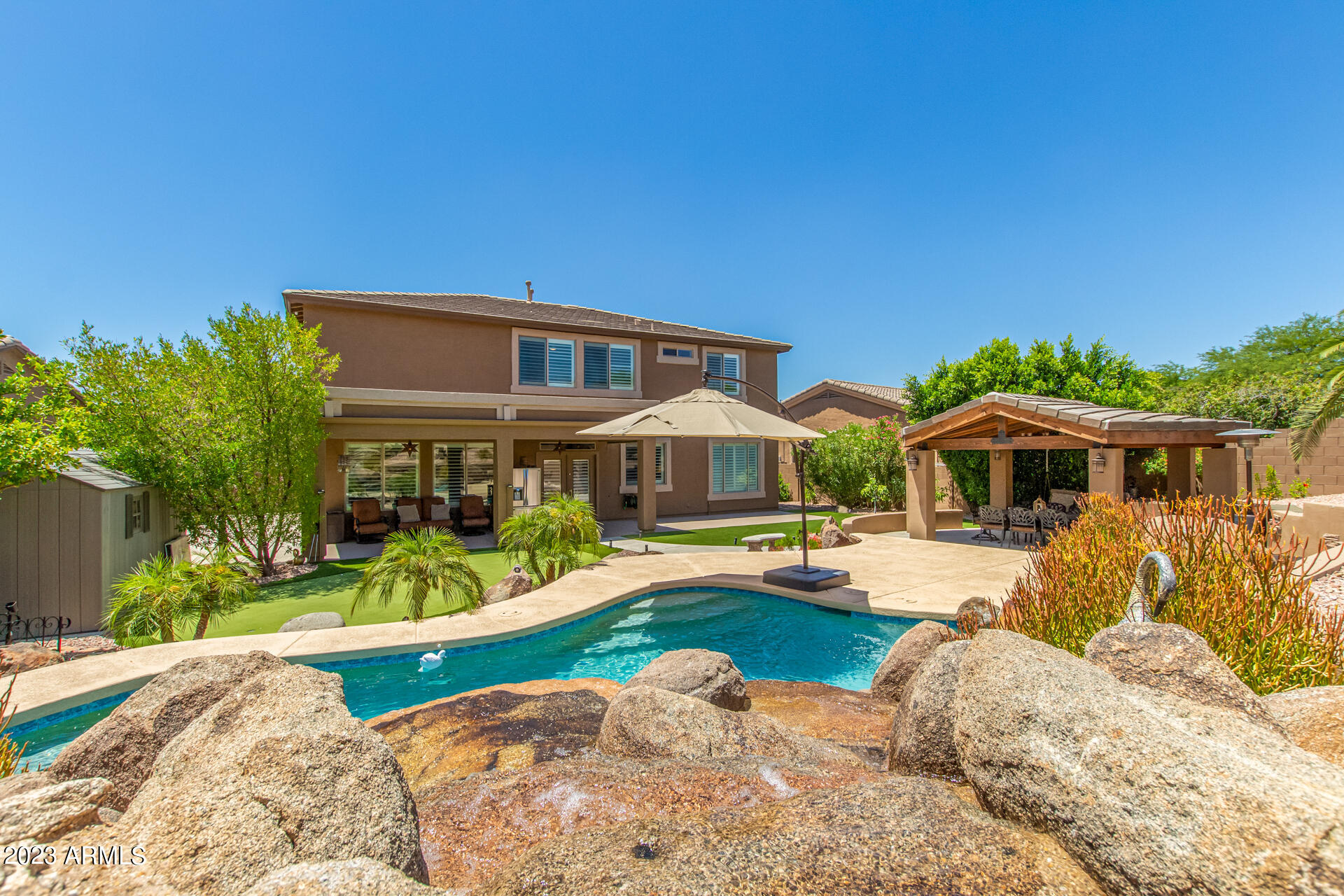 3416 West Montello Road Phoenix, AZ 85086 - Photo 52 of 71 a front view of house with yard and outdoor seating