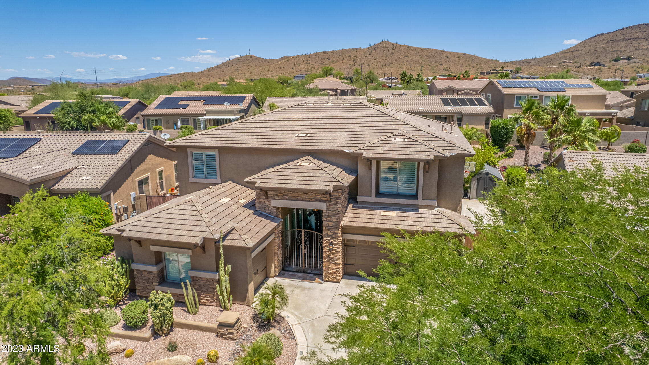 3416 West Montello Road Phoenix, AZ 85086 - Photo 61 of 71 an aerial view of a house with a yard and balcony