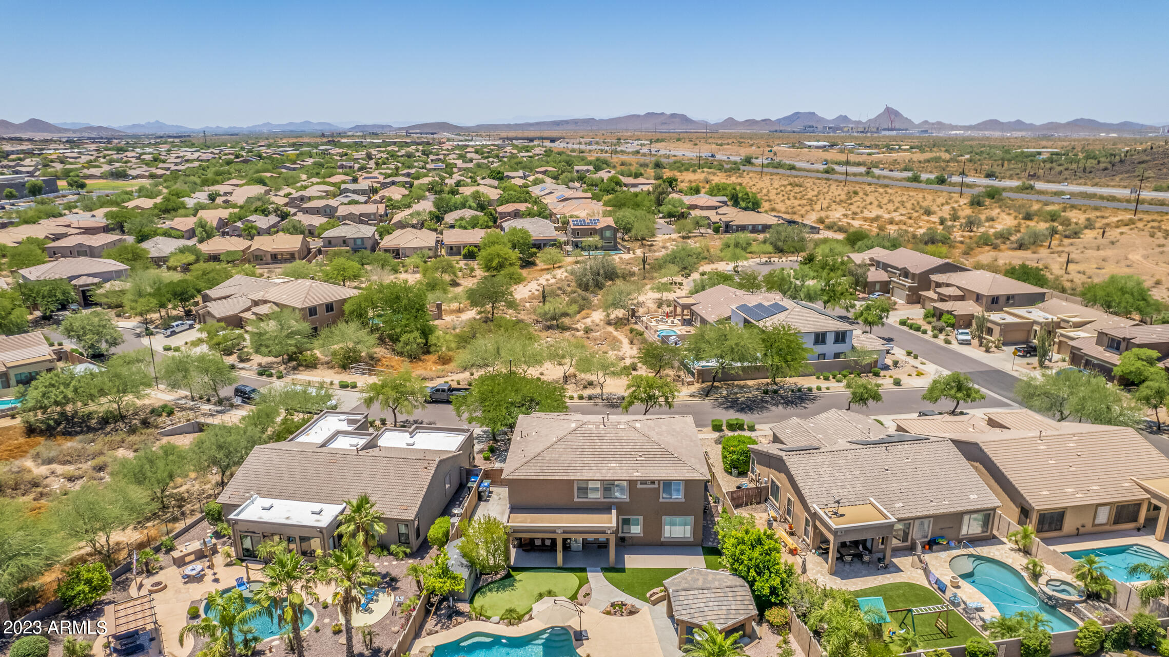 3416 West Montello Road Phoenix, AZ 85086 - Photo 67 of 71 an aerial view of residential houses with outdoor space
