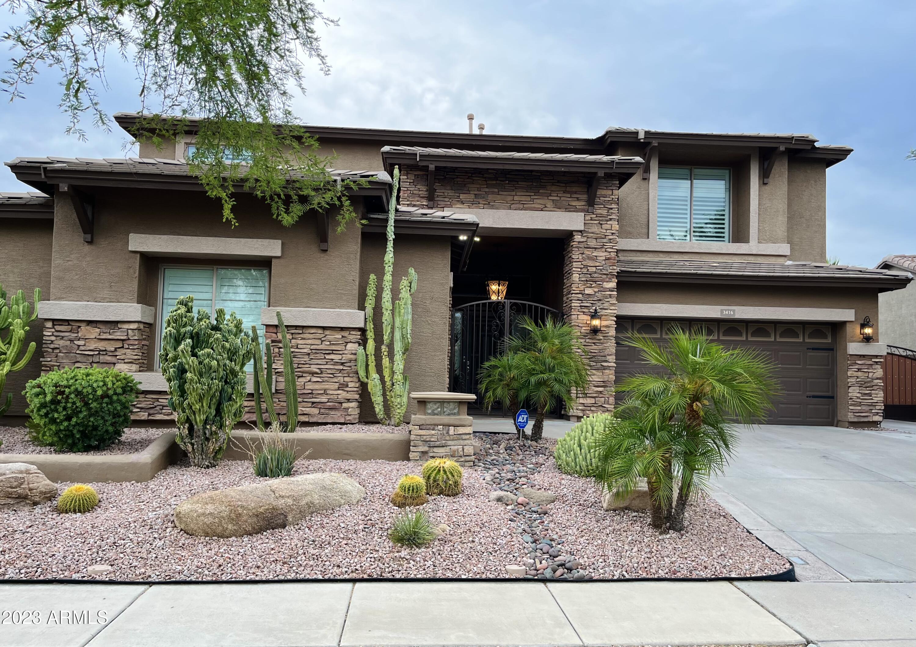 3416 West Montello Road Phoenix, AZ 85086 - Photo 70 of 71 a front view of a house with porch