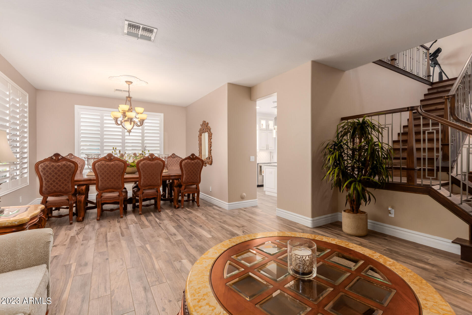 3416 West Montello Road Phoenix, AZ 85086 - Photo 10 of 71 a view of a dining room with furniture and chandelier