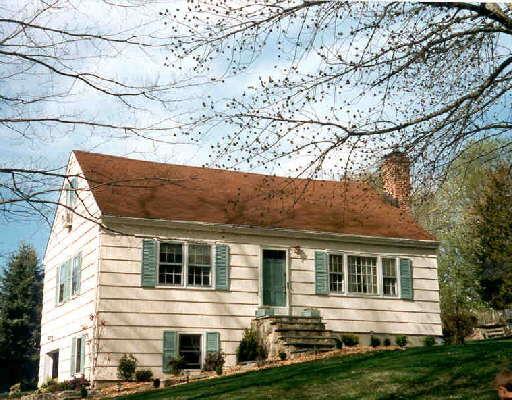 34 Twopence Road Ridgefield, CT 06877 - Photo 1 of 1 front view of house with a yard