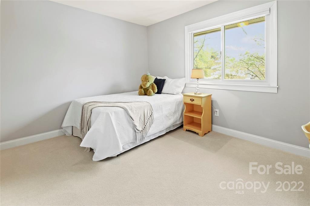 8438 Fairfield Forest Road Denver, NC 28037 - Photo 28 of 34 a bed room with a bed and a window