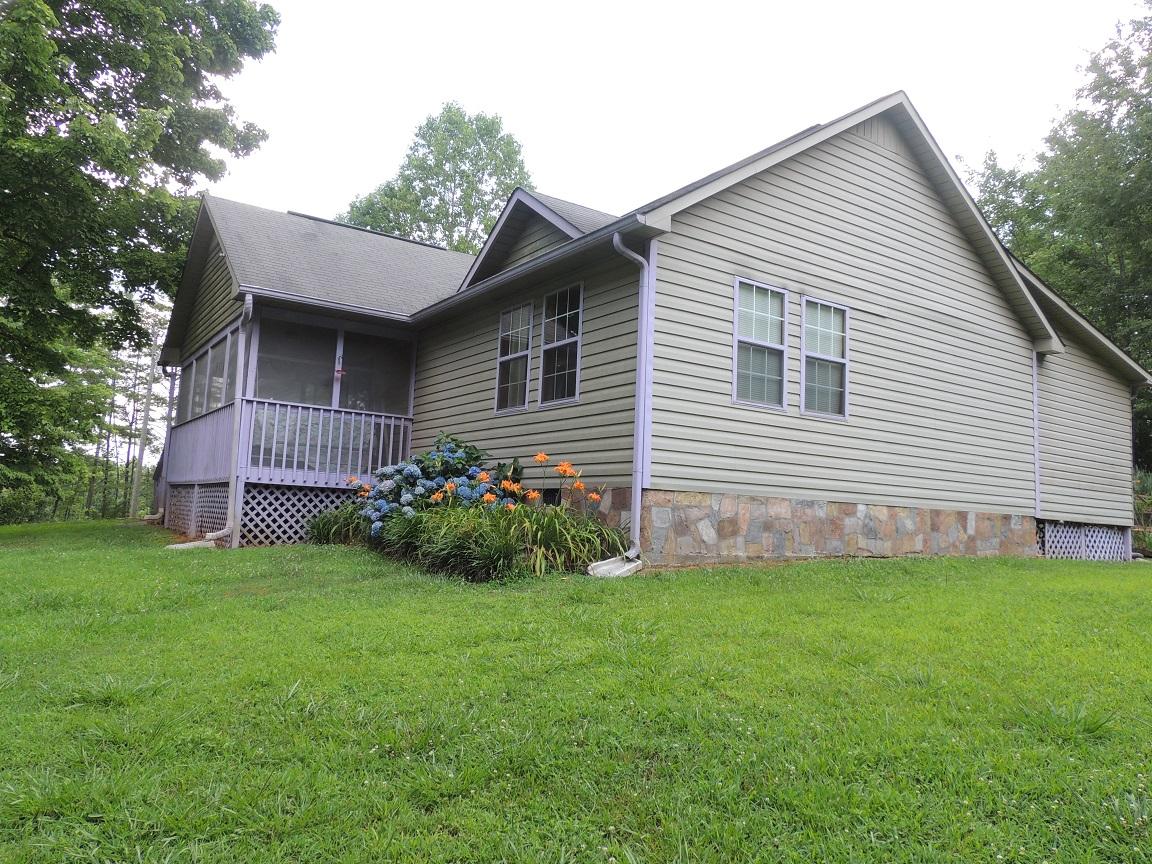 119 Dye Road Madisonville, TN 37354 - Photo 29 of 38 SIDE OF HOME FROM YARD
