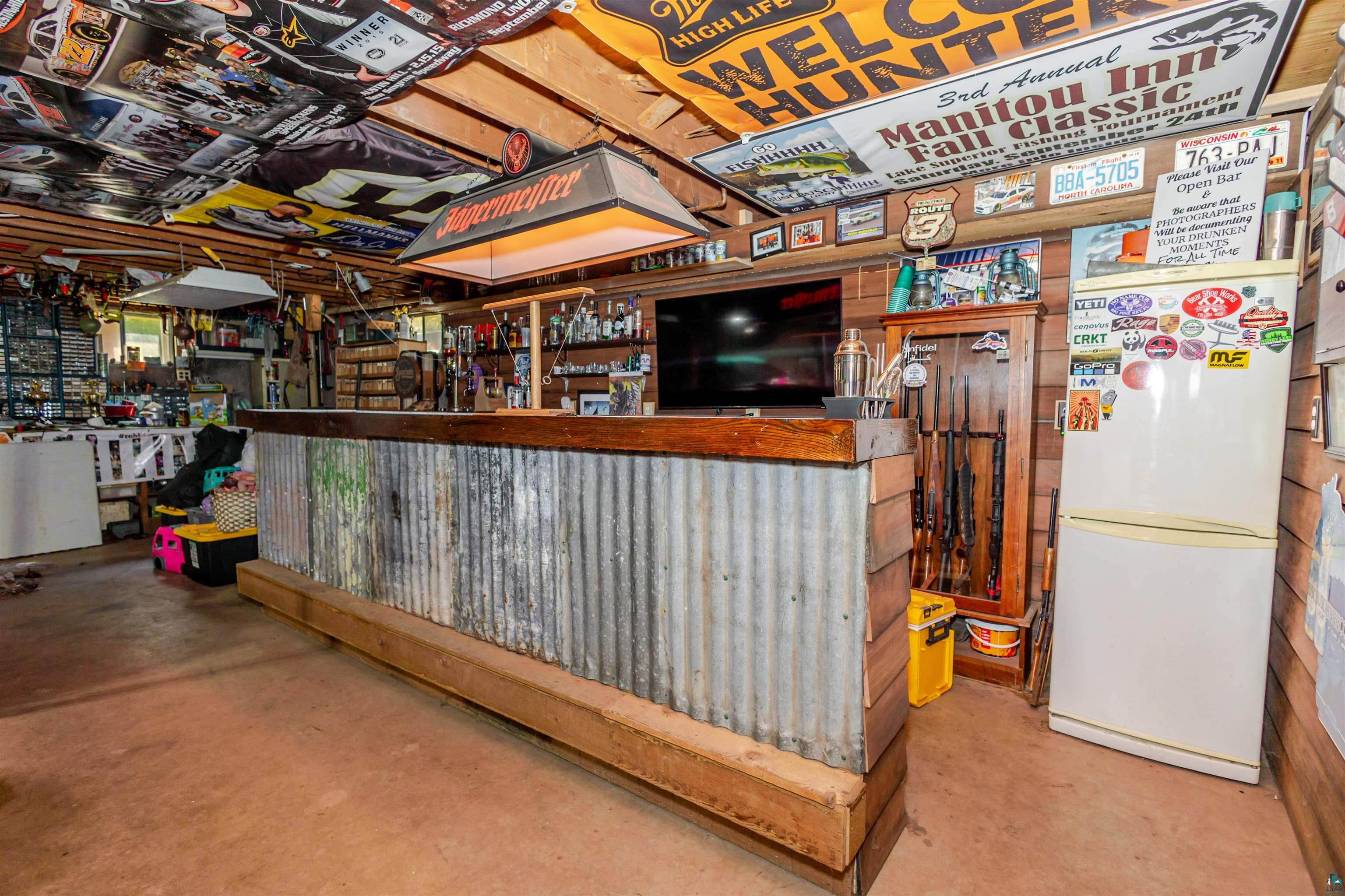 5539 South Darrow Road Superior, WI 54880 - Photo 16 of 19 Bar in Basement