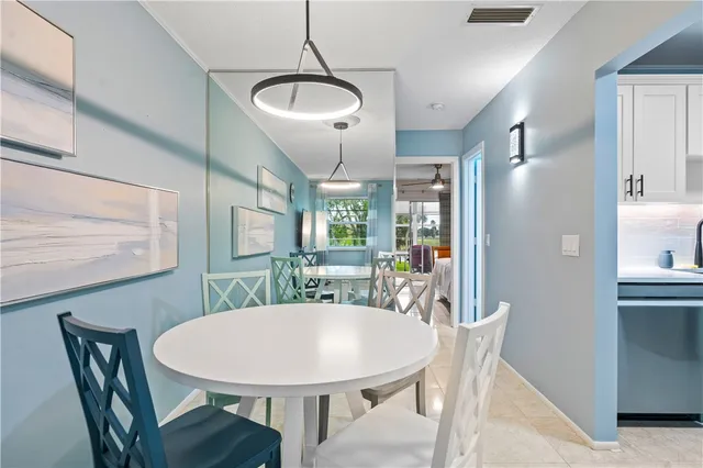 a view of a dining room with furniture