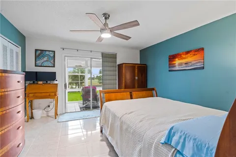 a bedroom with a bed and dresser