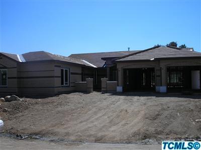 Front of house. Note the court yard area