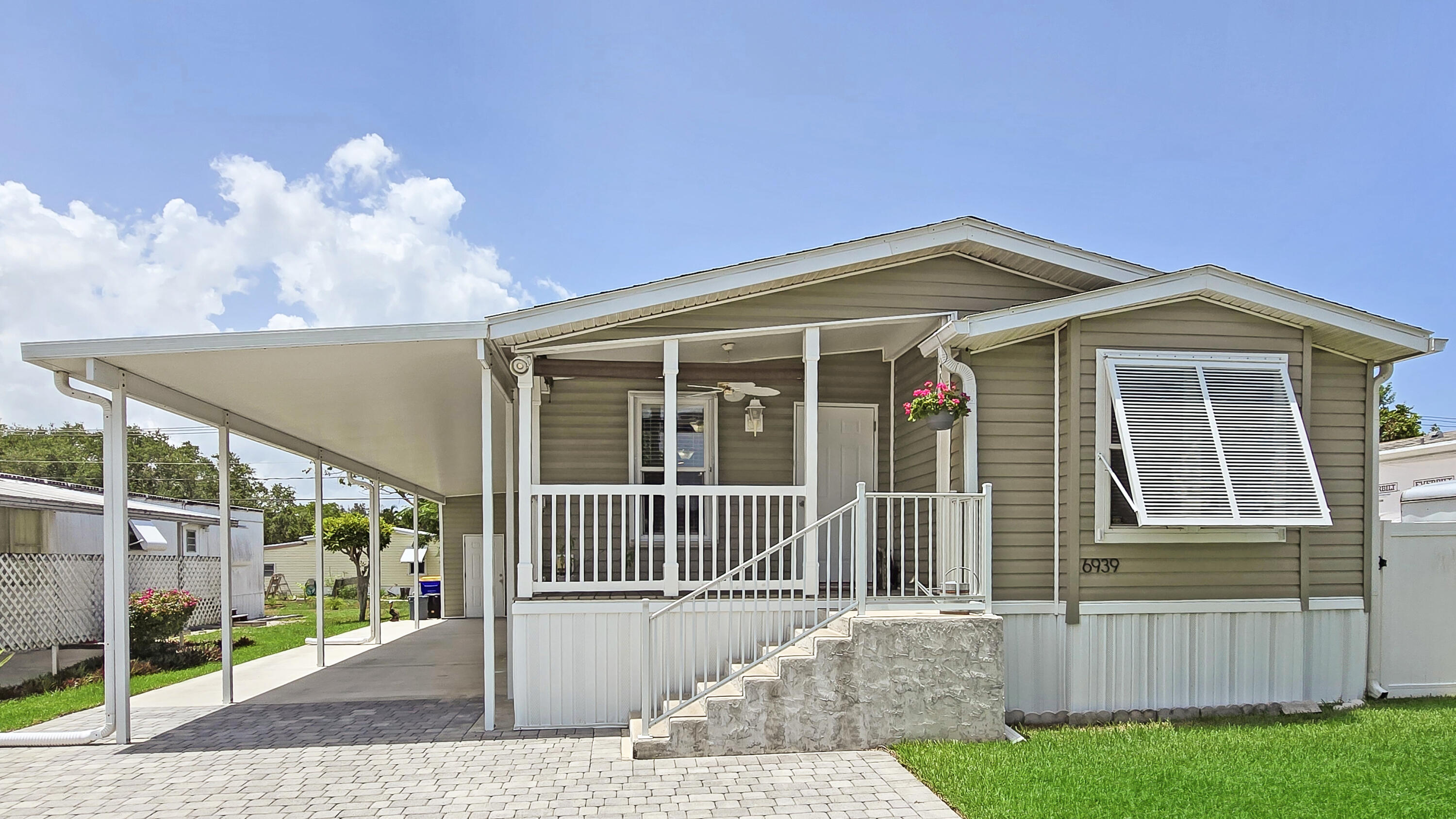6939 Southeast Ridgeway Terrace Hobe Sound, FL 33455 - Photo 2 of 68 Make Hobe Sound Your Home