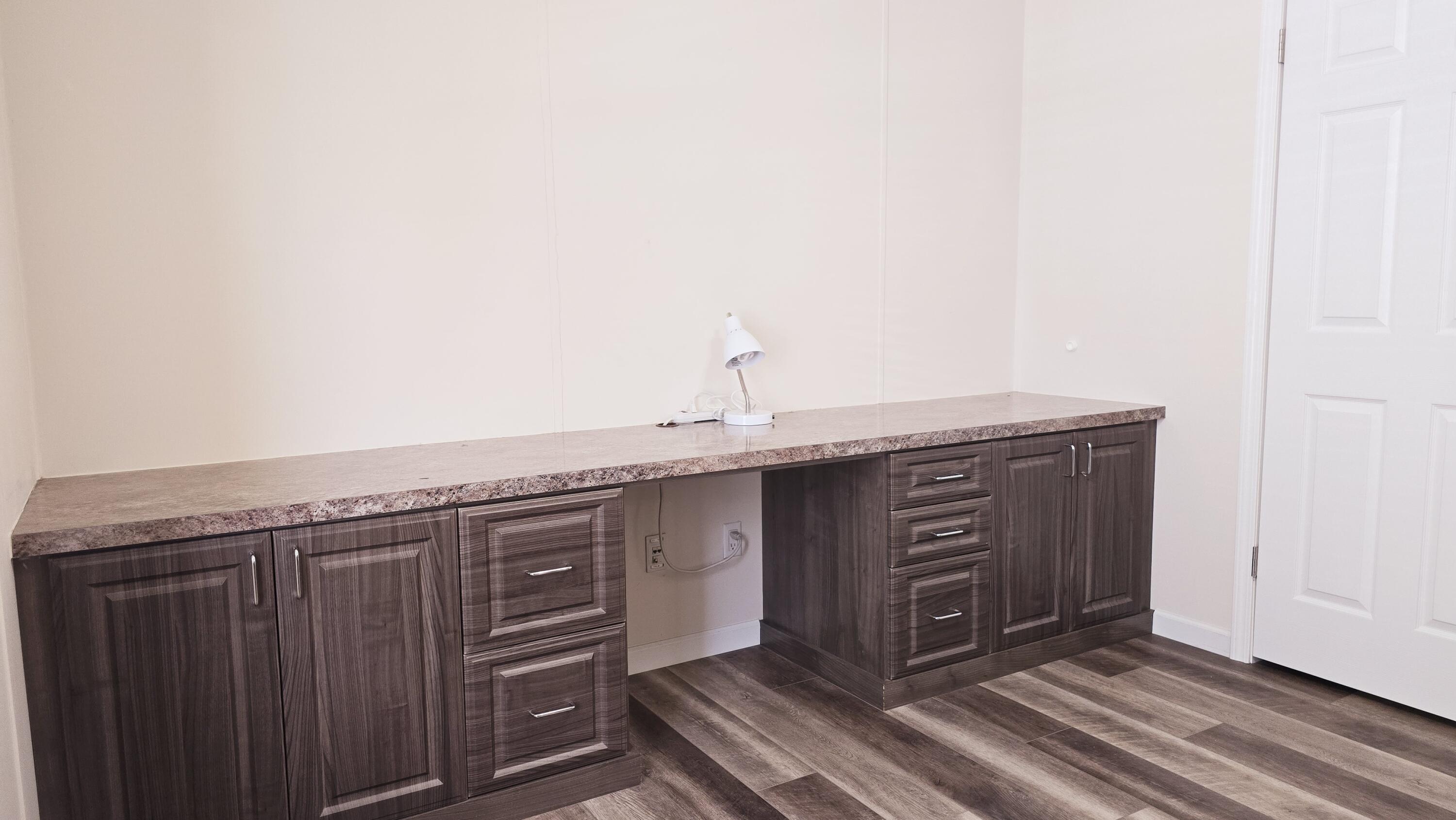 6939 Southeast Ridgeway Terrace Hobe Sound, FL 33455 - Photo 33 of 68 custom desk/cabinetry/counter