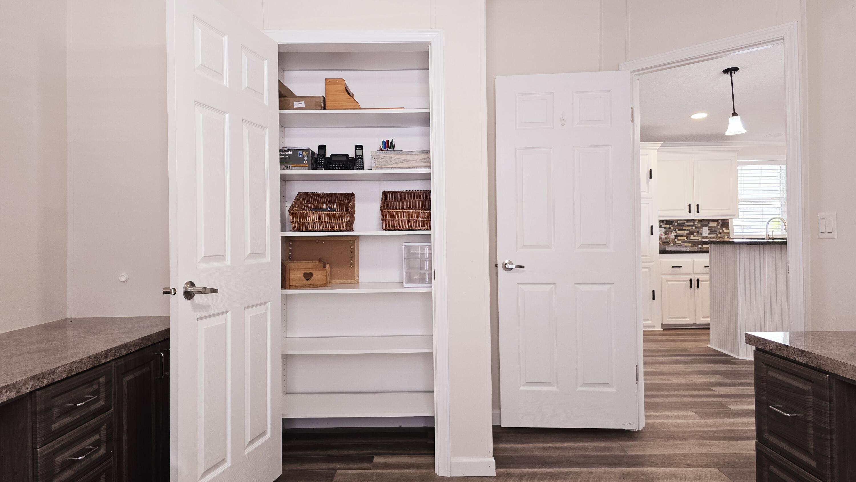 6939 Southeast Ridgeway Terrace Hobe Sound, FL 33455 - Photo 34 of 68 custom bookshelf closet