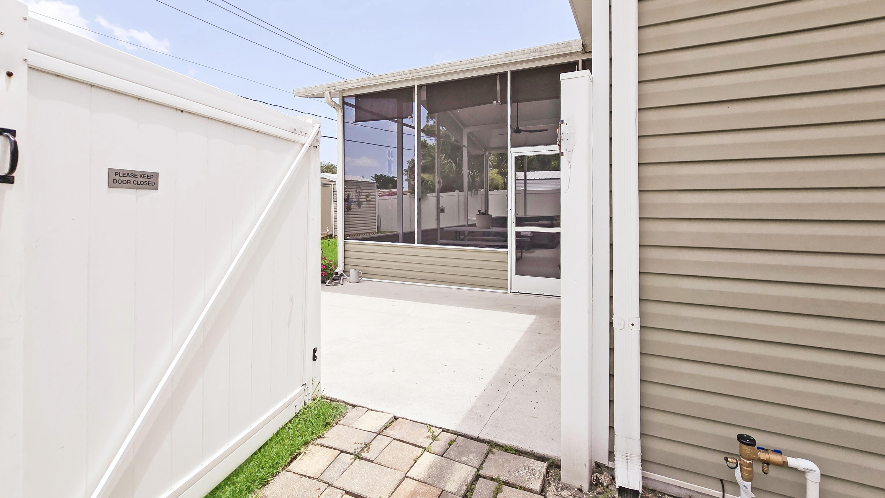 6939 Southeast Ridgeway Terrace Hobe Sound, FL 33455 - Photo 46 of 68 6 ft PVC Privacy Fence