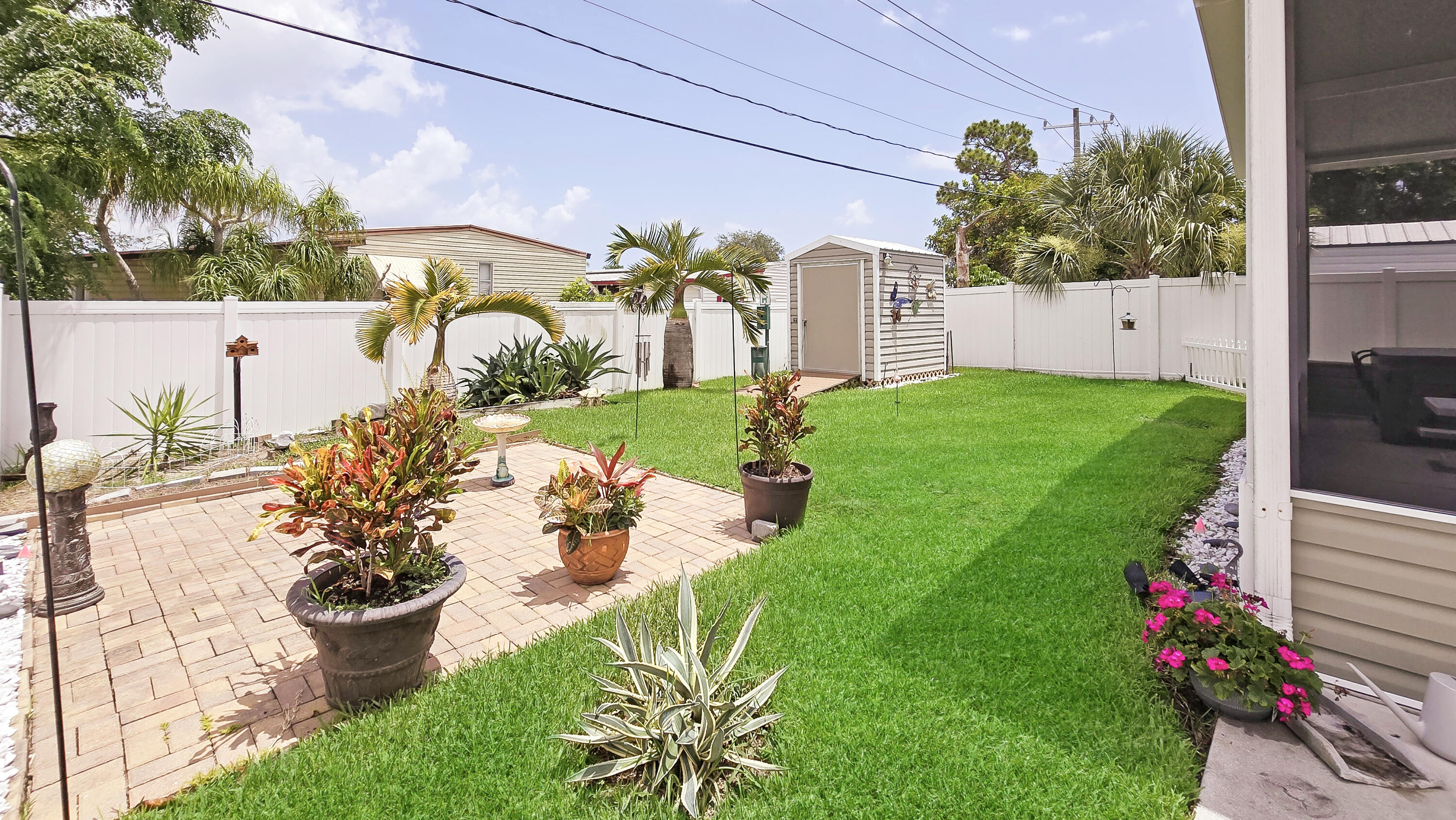 6939 Southeast Ridgeway Terrace Hobe Sound, FL 33455 - Photo 47 of 68 beautiful backyard