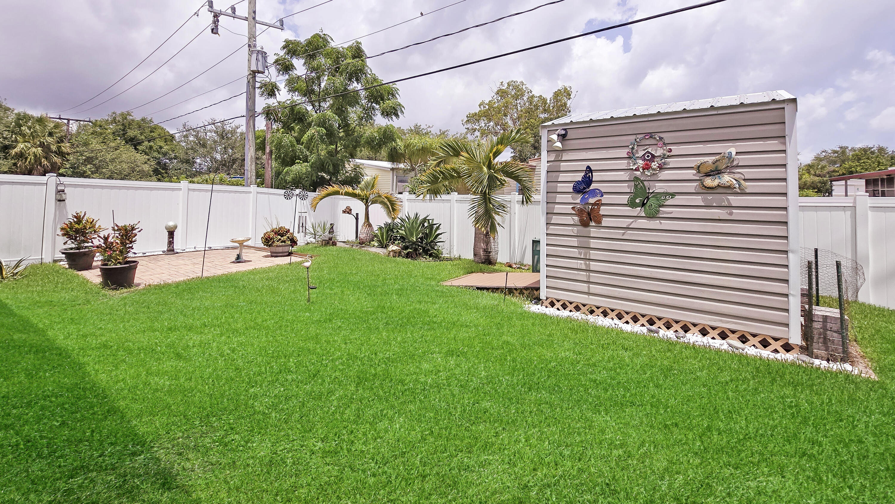 6939 Southeast Ridgeway Terrace Hobe Sound, FL 33455 - Photo 51 of 68 outdoor oasis