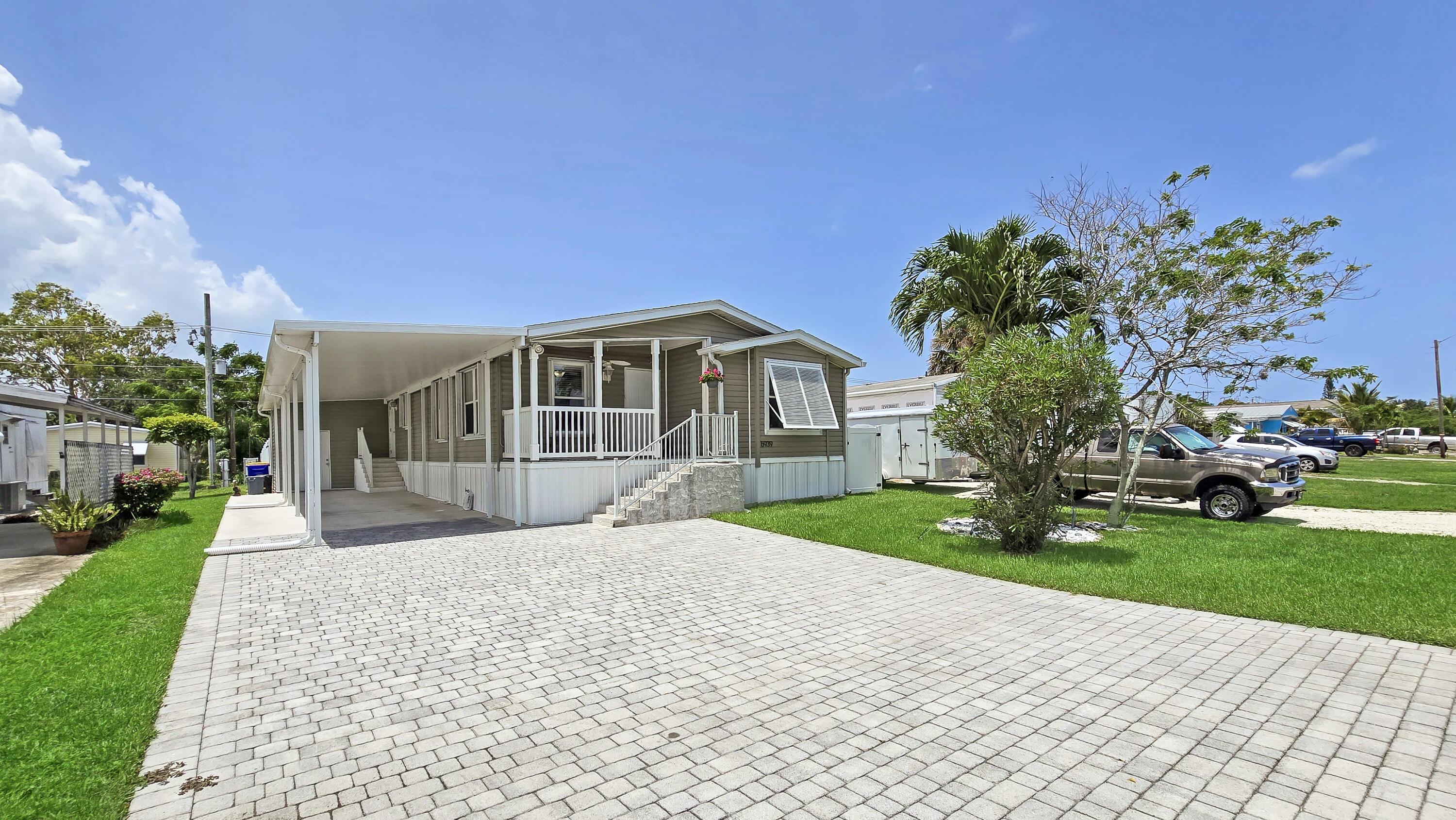 6939 Southeast Ridgeway Terrace Hobe Sound, FL 33455 - Photo 63 of 68 2020 custom paver driveway