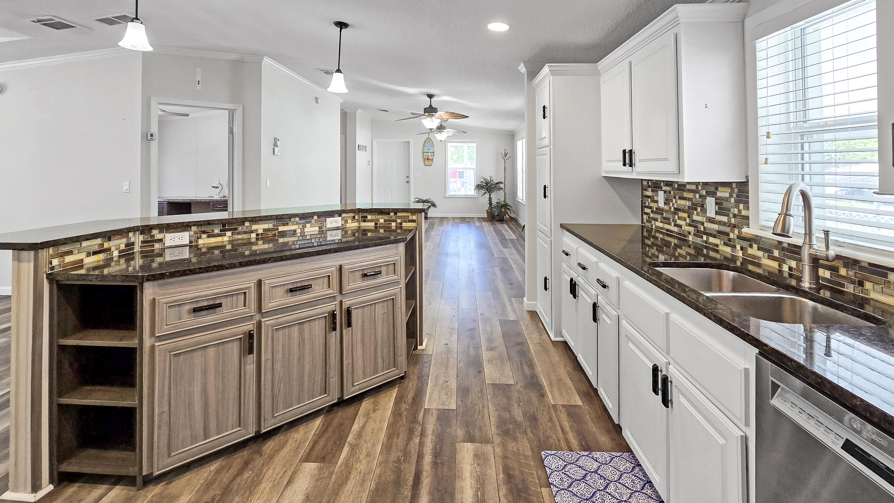 6939 Southeast Ridgeway Terrace Hobe Sound, FL 33455 - Photo 8 of 68 Cabinets and storage everywhere