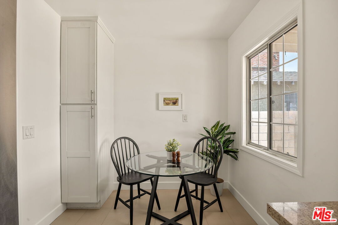 13610 Bracken Street Arleta, CA 91331 - Photo 13 of 23 a view of a room with a table and chairs
