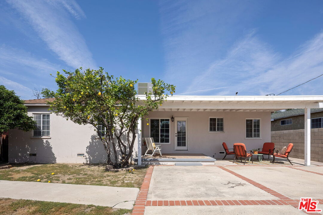 13610 Bracken Street Arleta, CA 91331 - Photo 20 of 23 a view of a house with a patio