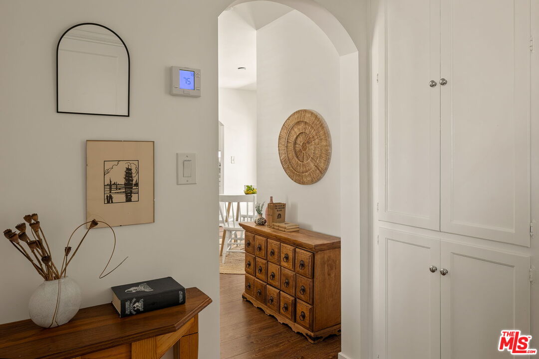 13610 Bracken Street Arleta, CA 91331 - Photo 7 of 23 a view of a room that has a table and a chair in it