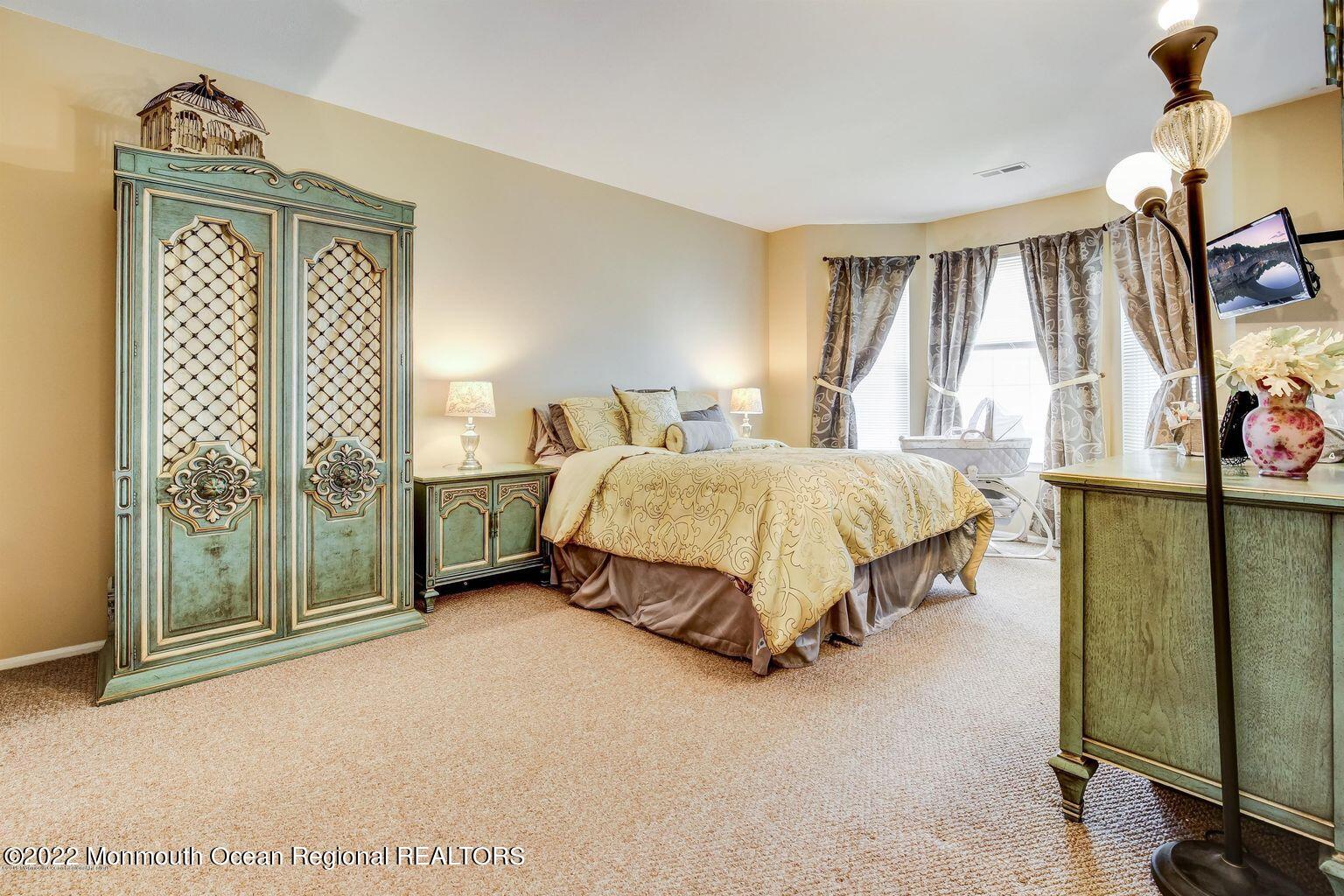 123 Hyacinth Lane Freehold, NJ 07728 - Photo 14 of 28 a living room with a bed furniture and a window