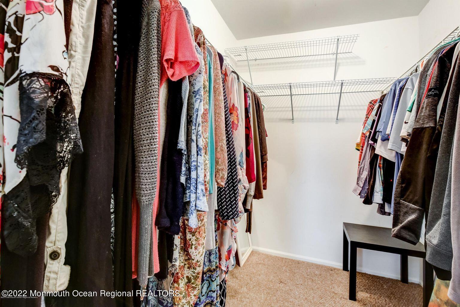 123 Hyacinth Lane Freehold, NJ 07728 - Photo 17 of 28 a view of walk in closet with clothes