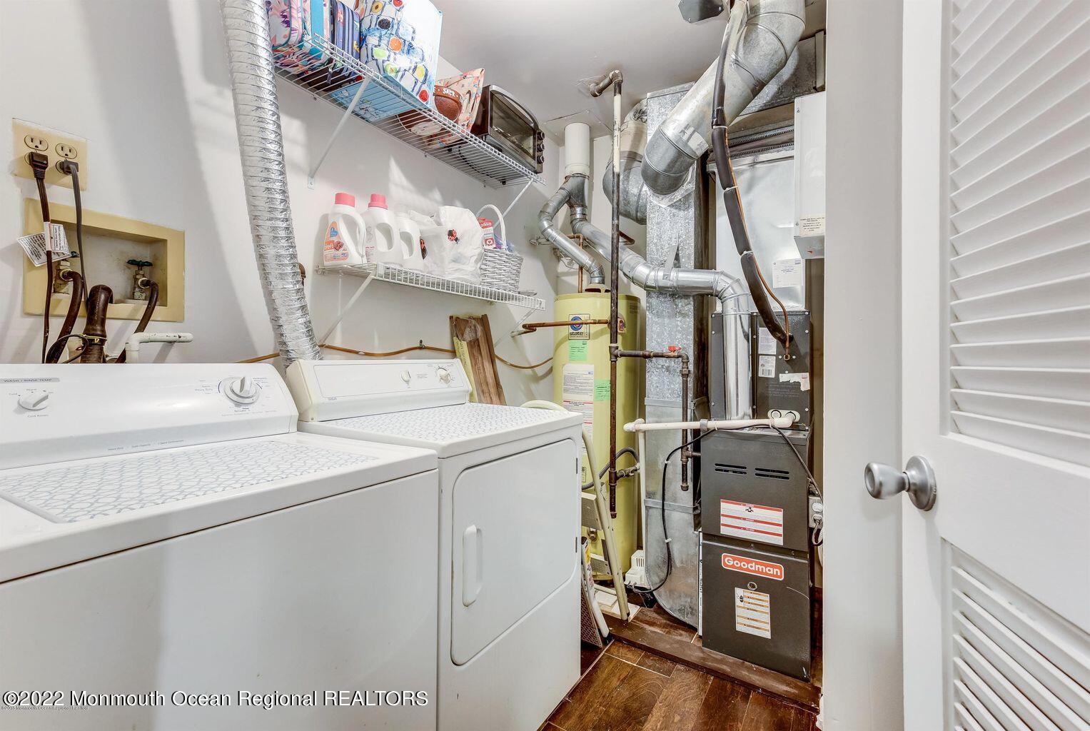 123 Hyacinth Lane Freehold, NJ 07728 - Photo 22 of 28 a utility room with dryer and washer