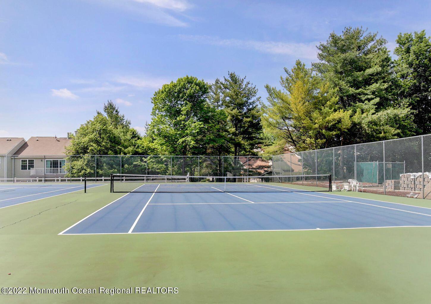 123 Hyacinth Lane Freehold, NJ 07728 - Photo 26 of 28 a view of a tennis court