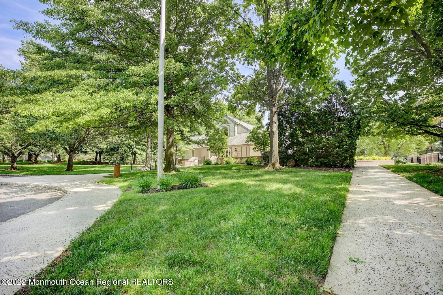 123 Hyacinth Lane Freehold, NJ 07728 - Photo 27 of 28 a view of a park with large trees
