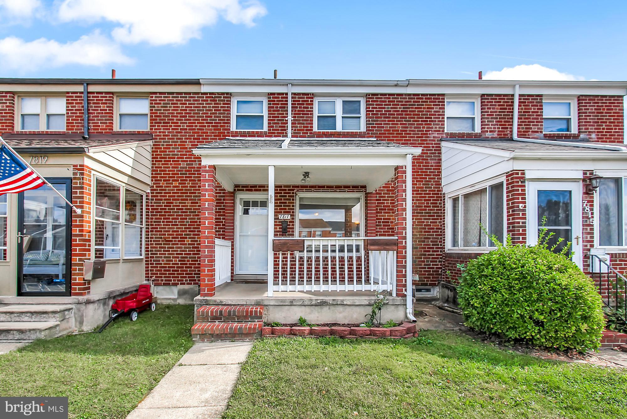 7817 Lockwood Road Baltimore, MD 21222 - Photo 1 of 23 a front view of a house with garden