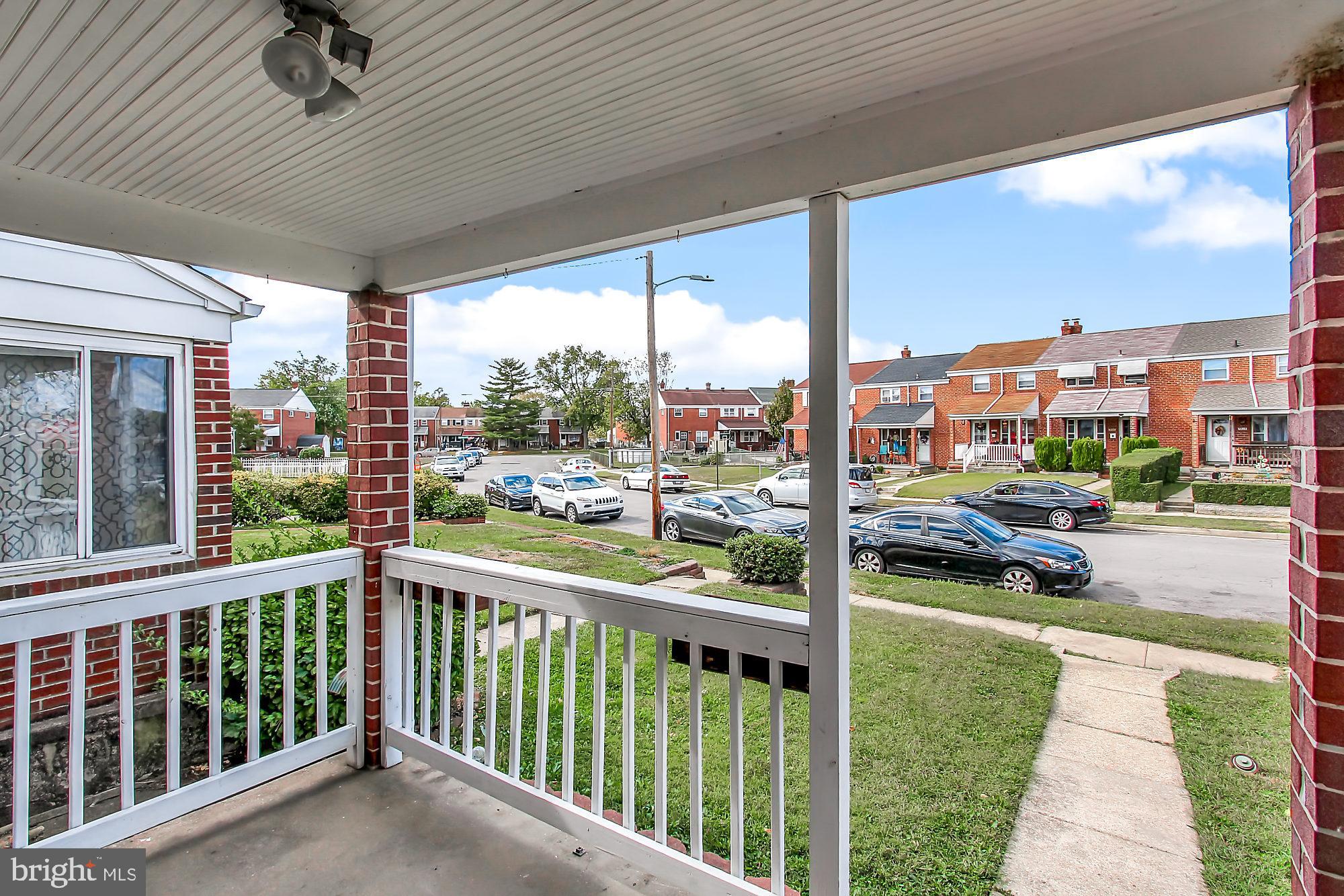 7817 Lockwood Road Baltimore, MD 21222 - Photo 22 of 23 a view of a porch with a patio
