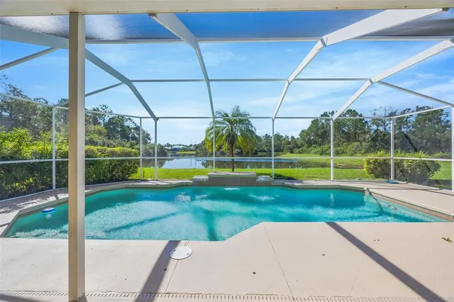 a view of yard with swimming pool