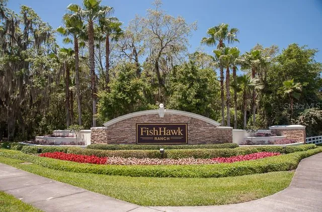 a view of a park with welcome board