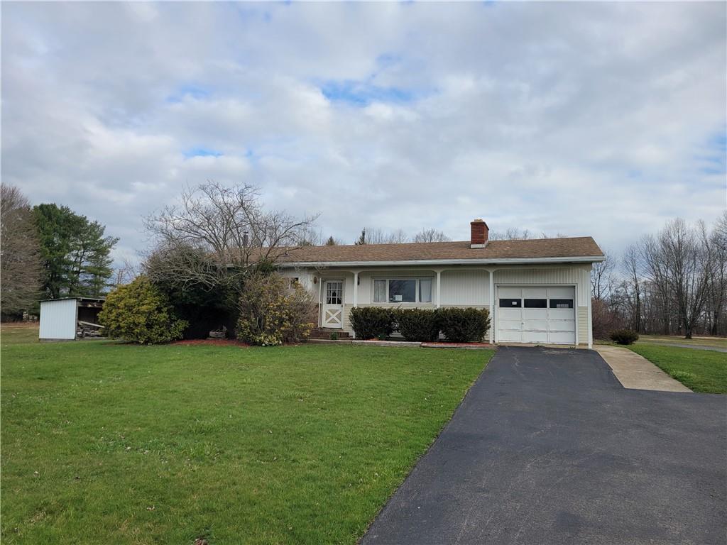 3143 Georgetown Road Polk, PA 16342 - Photo 1 of 15 a view of a yard in front of house