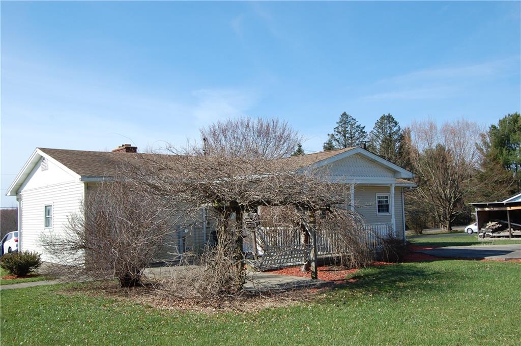 3143 Georgetown Road Polk, PA 16342 - Photo 2 of 15 a view of a house with a yard