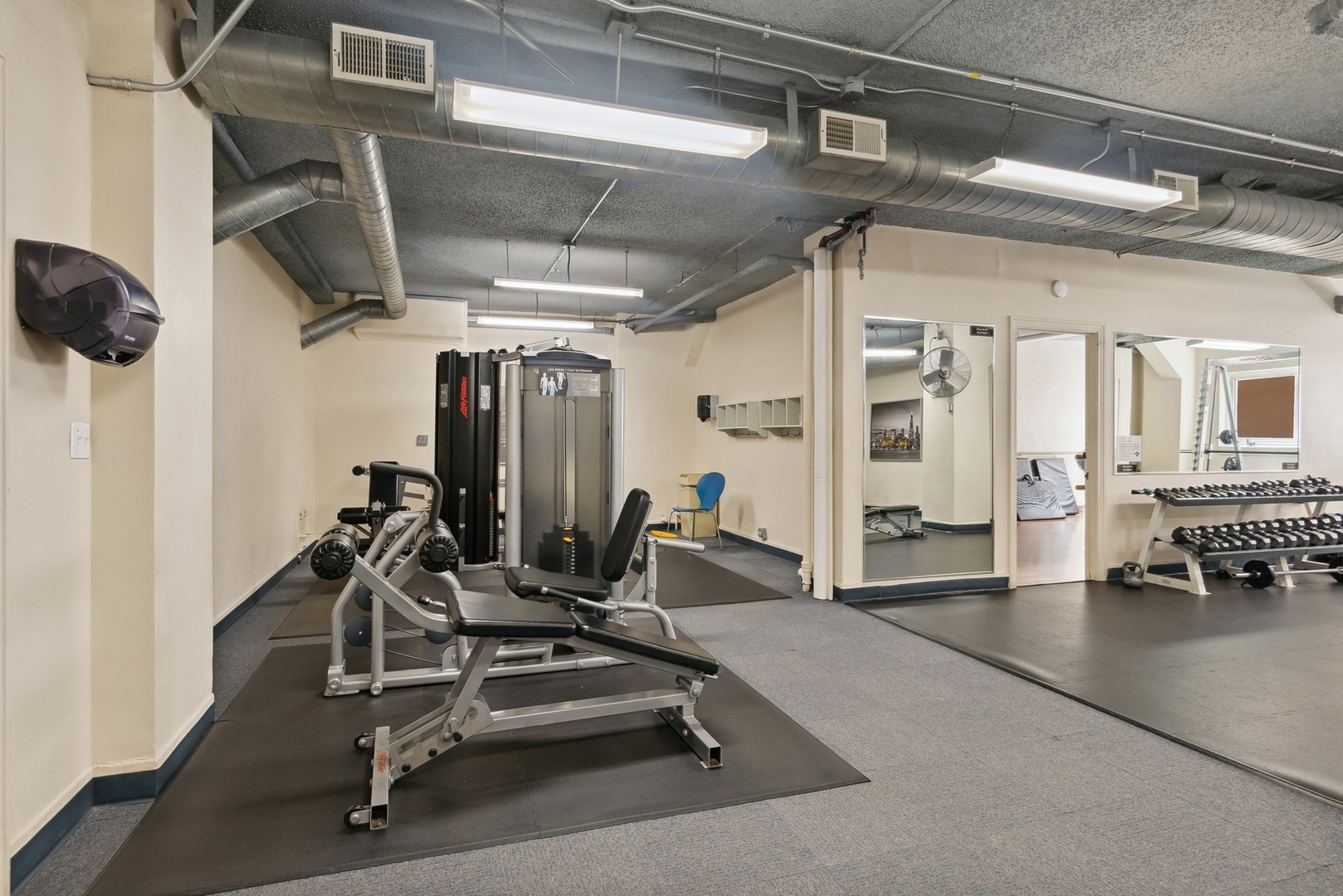 5555 North Sheridan Road, Unit 160304 Chicago, IL 60640 - Photo 7 of 7 a view of a room with gym equipment