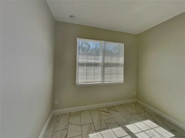 an empty room with a window