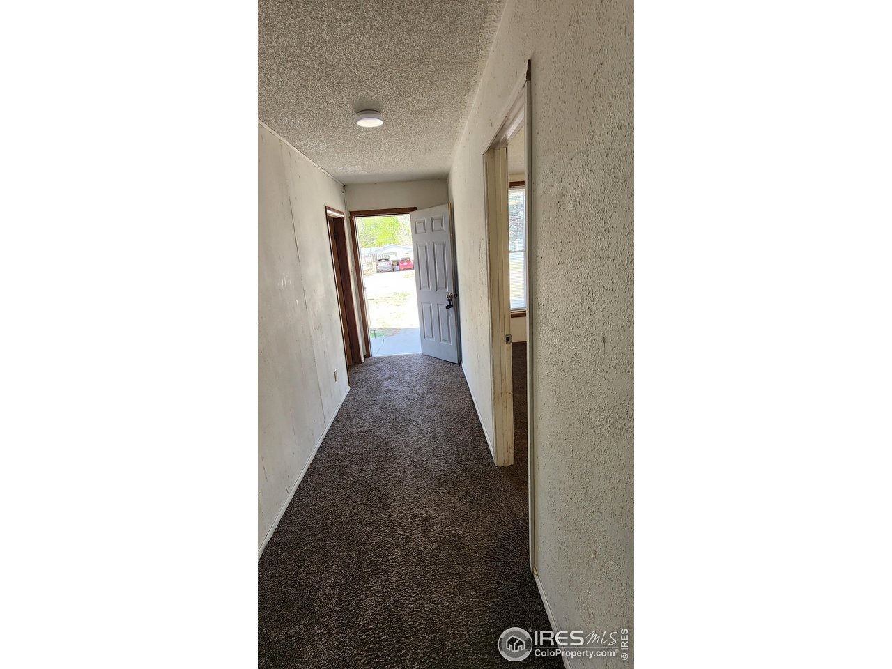 303 South 2nd Street Sterling, CO 80751 - Photo 20 of 37 a view of a hallway with windows