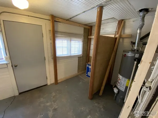 a bathroom with a sink toilet and mirror